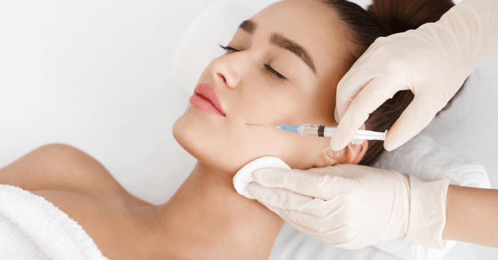 An image of a woman getting an injectable treatment for an article on Deserve Aesthetics clinic situated in Norwich, which offers them