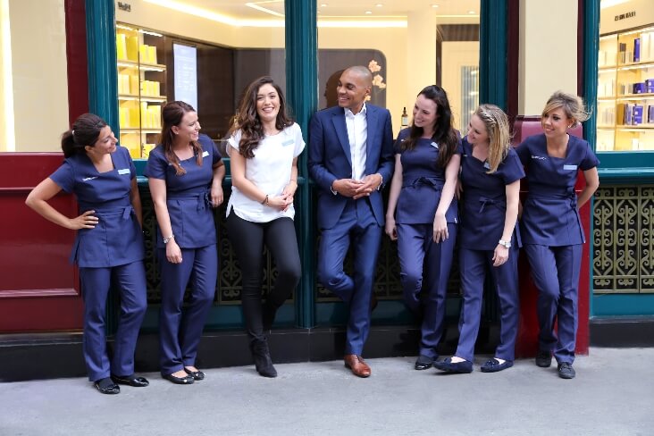 An image of Dr Askari Townsend with his team at Askinology clinic
