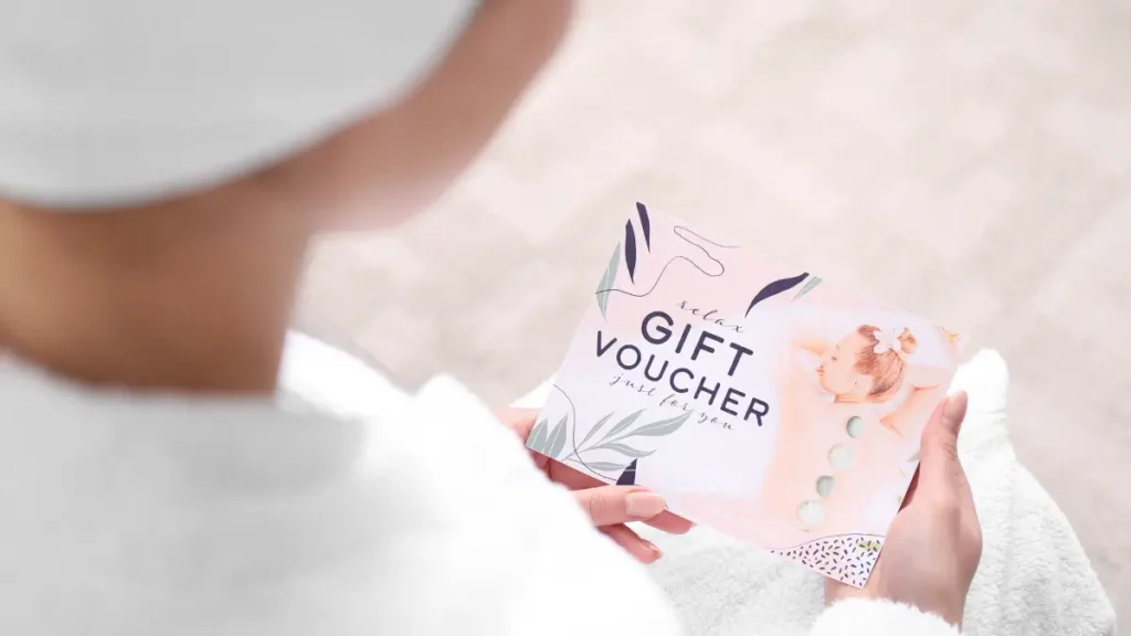 An image of a woman looking at a beauty treatment gift voucher