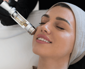 aesthetic practitioner performing HydraFacial on female client