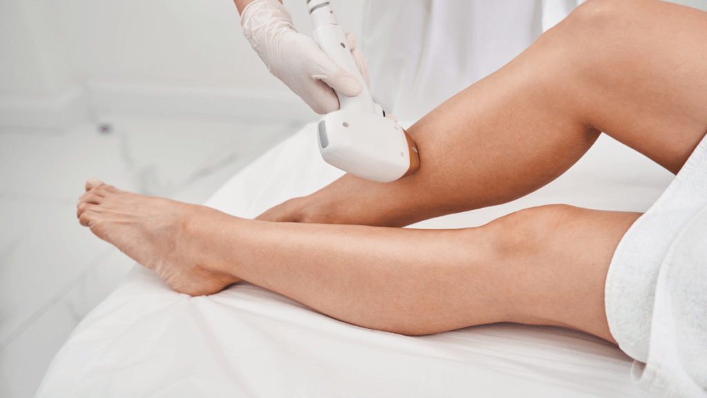 An image of a laser hair removal device removing leg hair