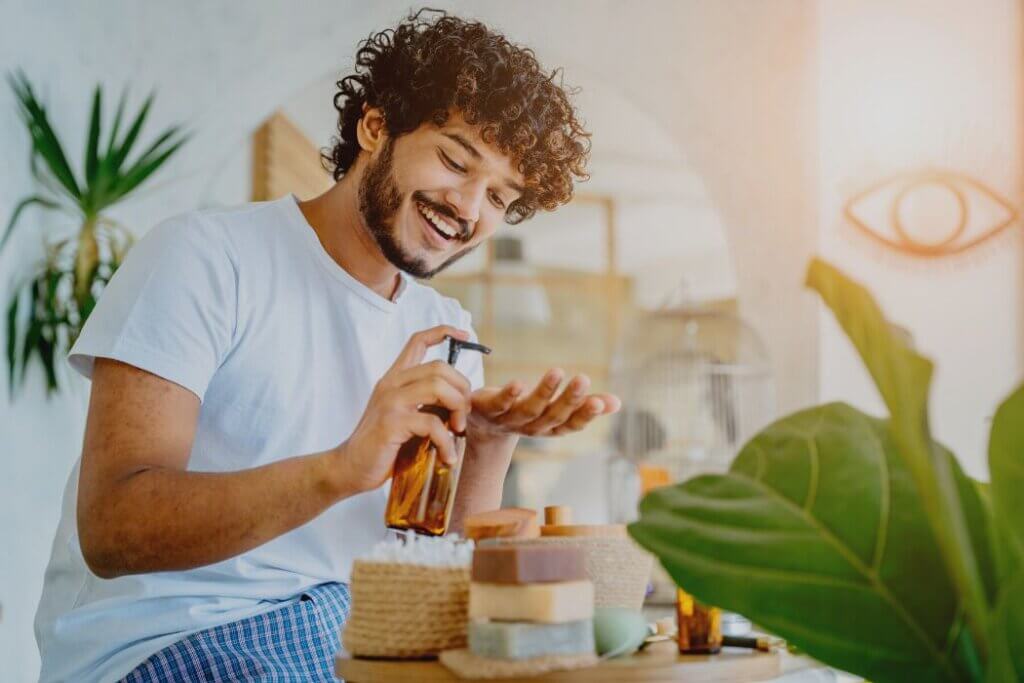 Latin man using environmentally-friendly skincare product