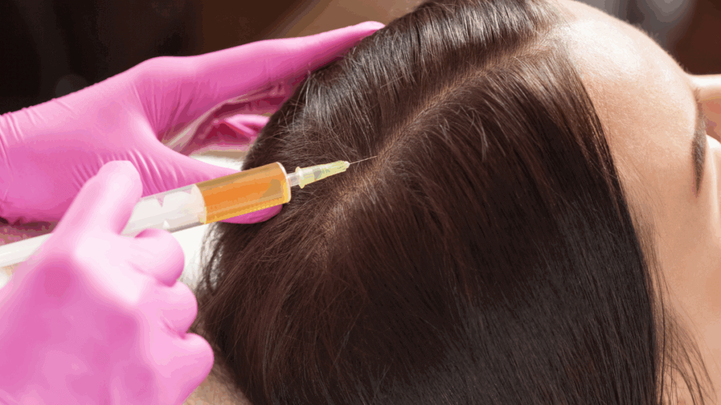 An image of a woman getting PRP therapy to help restore her scalp health and hair growth