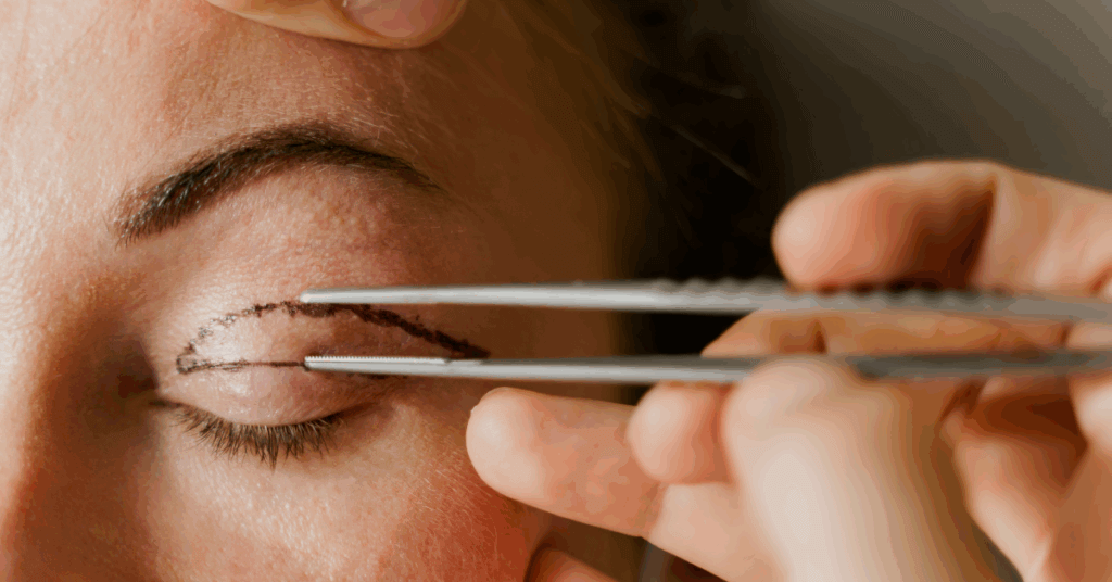 an image of a plastic surgeon marking a woman's eyelid for eyelid surgery for an article about the Rules of Aesthetic Practice