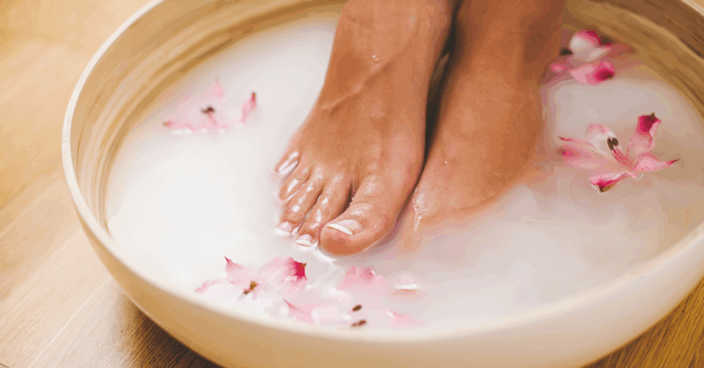 One the more popular skincare hacks, and image showing feet soaking is a honey and milk bath