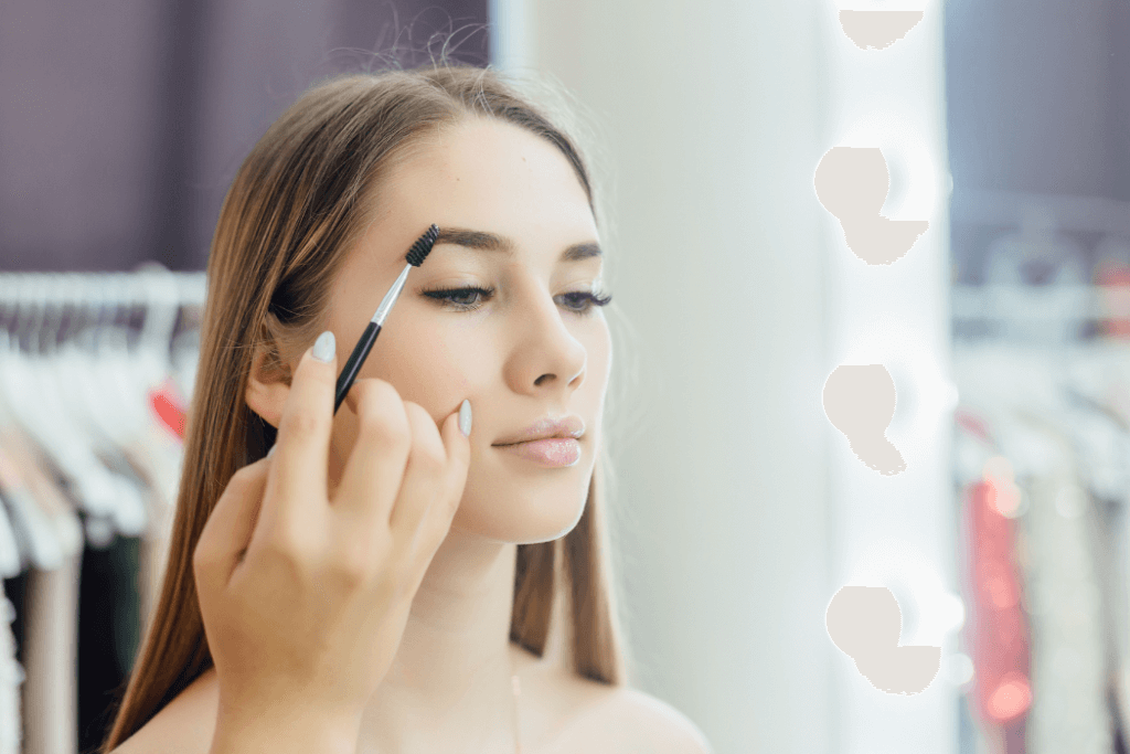 Beautiful woman doing her makeup