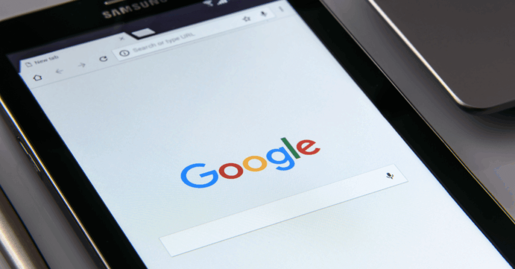 image of a phone showing a Google search engine, for an article that talks about the natural beauty trend and how it impacts clinics