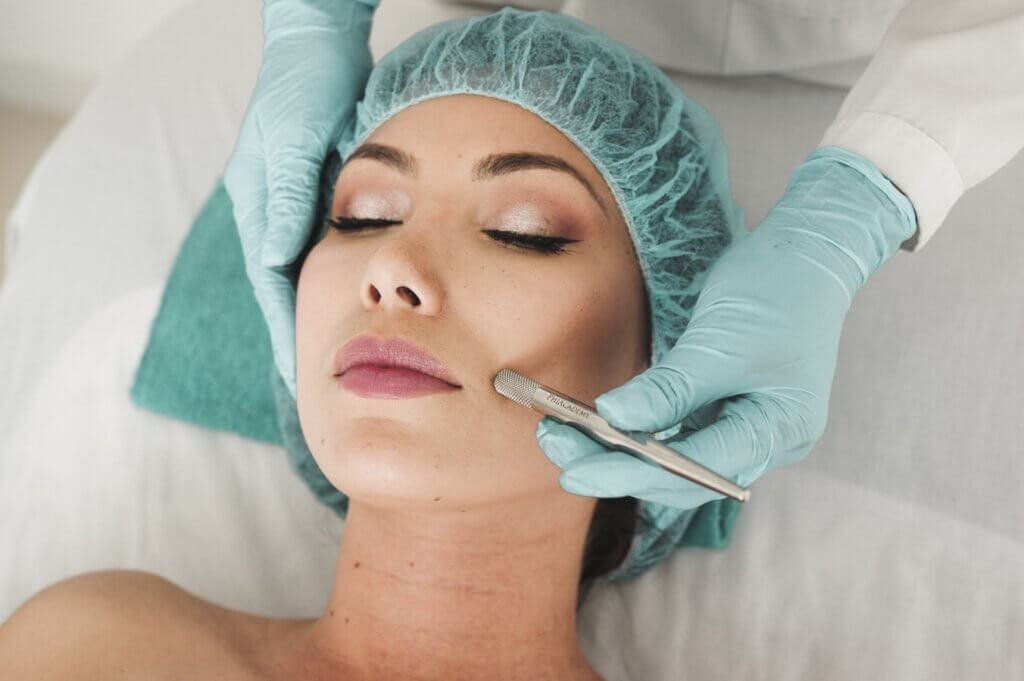 Women getting a cosmetic treatment done