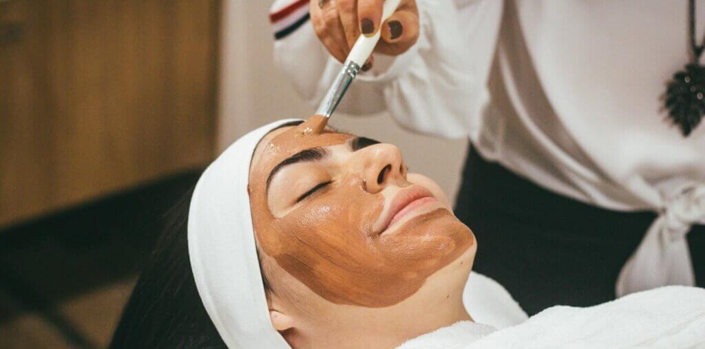 having a facial at a clinic